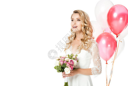 年轻快乐的新娘带新娘花束和空气球图片