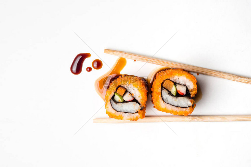 寿司日本食品加州卷与筷子图片