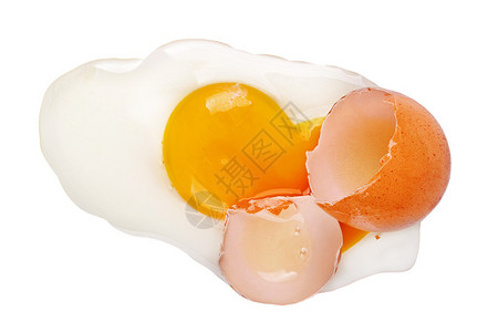 用白色隔开的破鸡蛋的顶视图图片