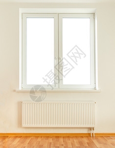 下有散热器的白色塑料双窗背景图片