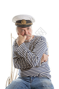 穿条纹衬衫和帽子的老水手肖像图片