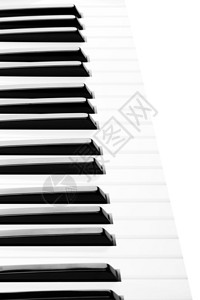 白色上的物体钢琴键盘特写图片