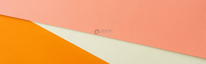白粉和橙色亮纸的抽象几何背图片
