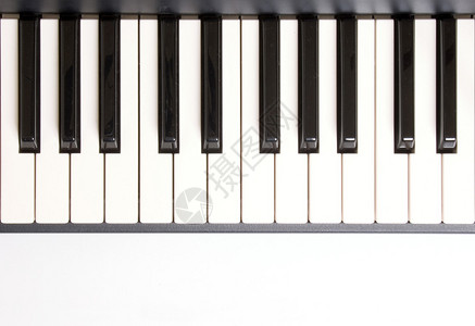 学习弹钢琴的照片背景图片