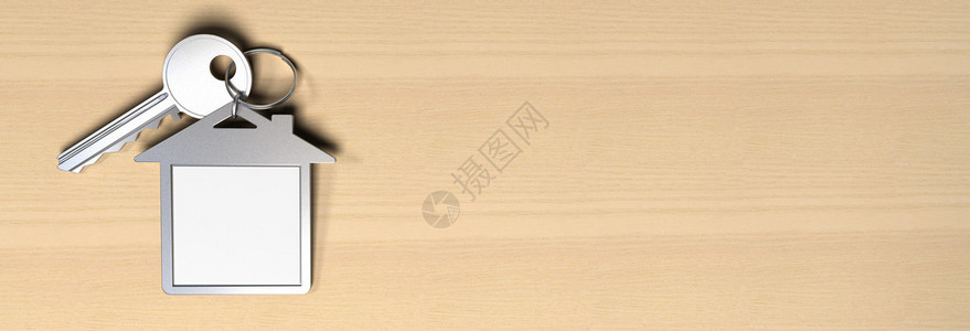 木背景上的房屋符号键盘和密钥是空间微调文本的复制件图片