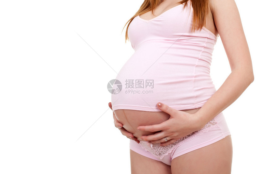 孕妇腹部的特写侧视图图片