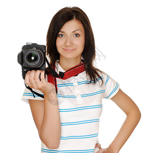 带相机的年轻女孩摄影师在图片