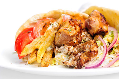 塞满肉沙拉洋葱番茄和土豆的greek图片