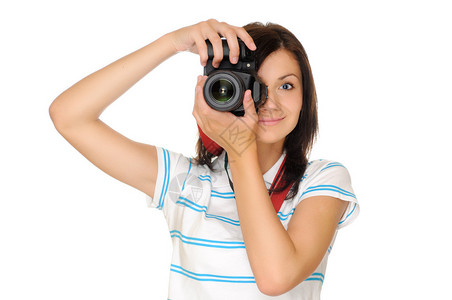带相机的年轻女孩摄影师在图片