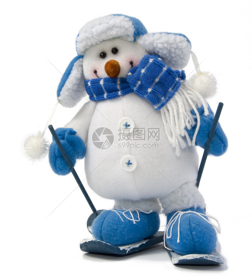 雪人穿着帽子和围巾滑雪在白色图片
