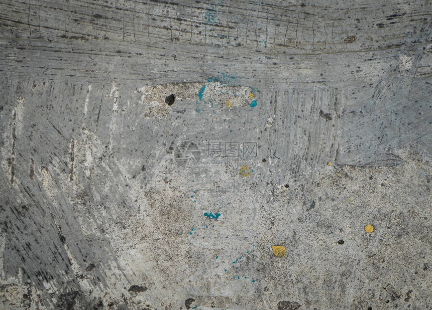 有划痕和油漆的粗糙混凝土地板图片
