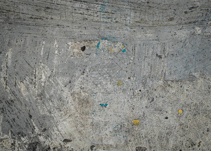 有划痕和油漆的粗糙混凝土地板图片