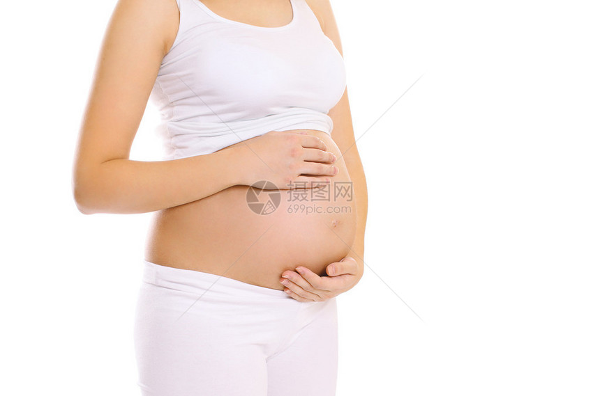 以白色背景对年轻孕妇图片