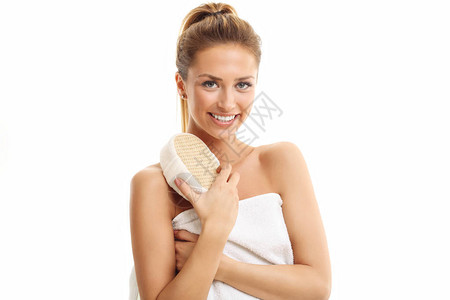 妇女用浴海绵与健康皮肤隔离在白图片