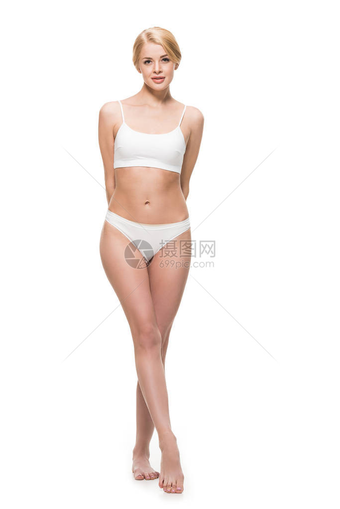 穿着内裤的美丽瘦女孩全视站着看在白色上图片