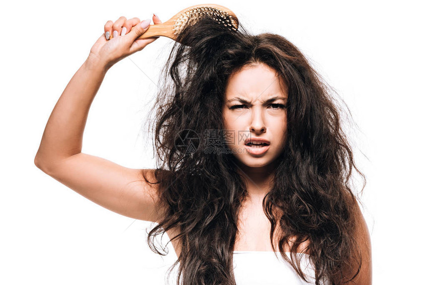黑发女人的头发长着不纯正卷头发白边图片