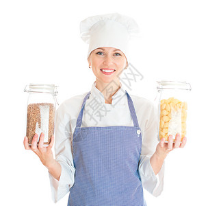 女厨师的面食和奶热烹饪肖像图片