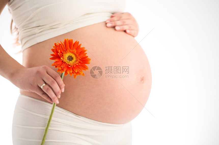 怀孕妇抚摸她的肚图片
