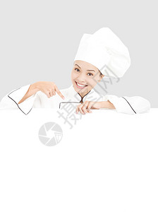 微笑的年轻女厨师图片