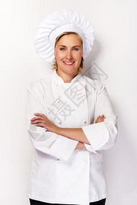 身穿厨艺服的女厨师在白色背景图片