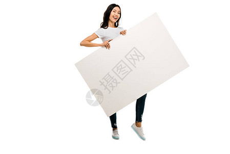 快乐的年轻女拿着空白标牌微笑图片
