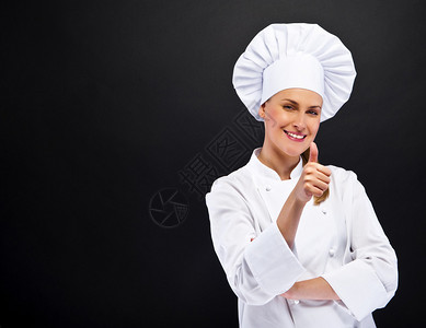 厨师女主厨在黑图片