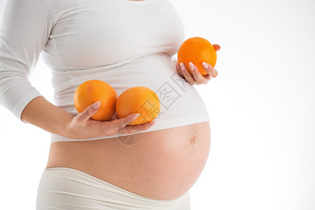 怀孕和吃热餐概念图片