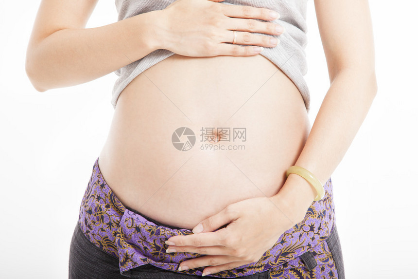 关闭孕妇的腹部图片