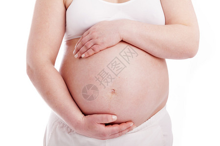 紧贴一个怀孕的肚子孤立图片