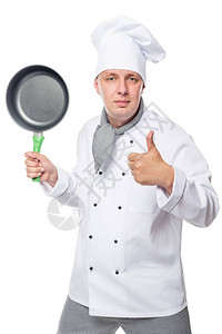 满意的厨师举起大拇指在白色背图片
