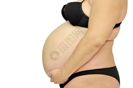 孕妇腹部被白色隔离图片