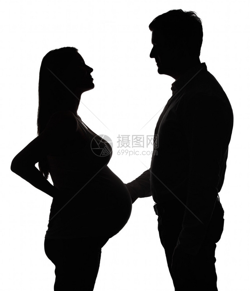 带丈夫的怀孕妇女用白图片