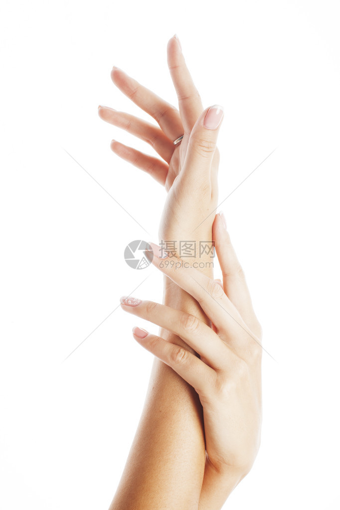 美丽精致的手与美甲持有花百合关闭孤立在白色完美的形状理图片