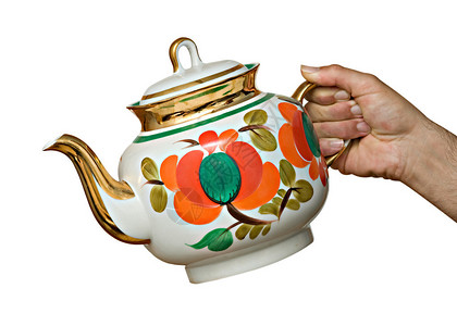 手握陶瓷茶壶图片