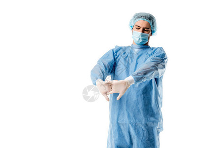 身穿蓝色制服的外科医生举起双手在白图片