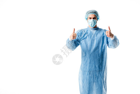 身穿蓝色制服的外科医生和医用帽子图片