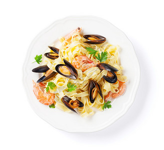 美味的意大利面有海产食品贝类和虾图片