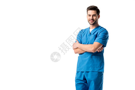 男护士身穿蓝色制服双臂交叉站立图片