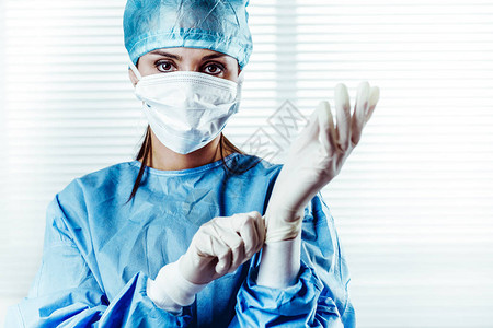 女医生蓝色洗涤剂外科大夫肖像戴上外科图片