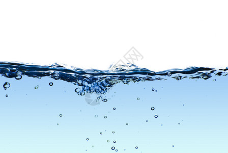 孤立的蓝色水溅着气泡和水滴抽象的蓝色图片