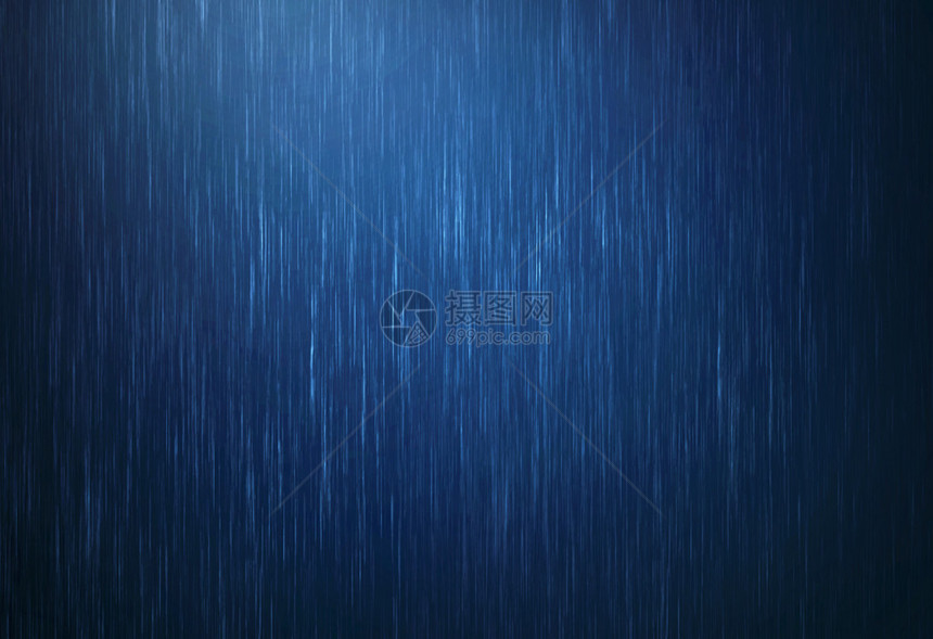 在雨季水滴落以深蓝色为草原背景的雨图片