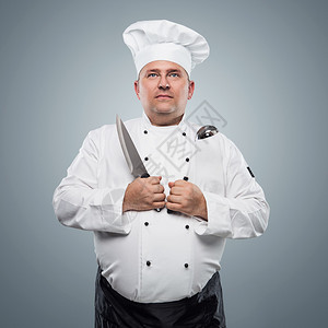 在蓝色背景的有趣的超重厨师图片