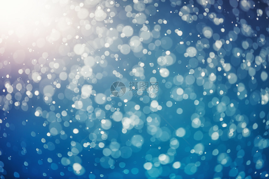 蓝色背景上的雪景纹理图片