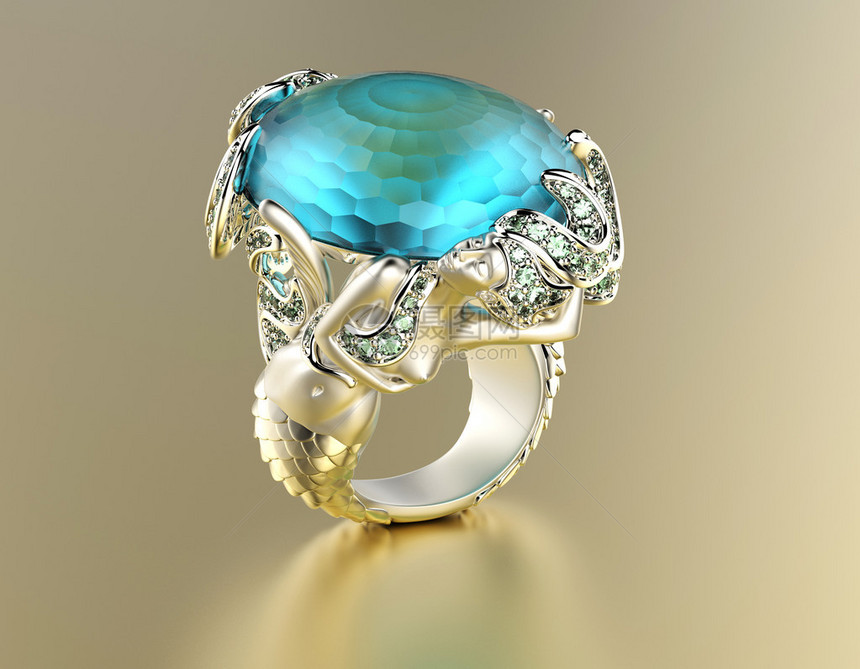 金色订婚戒指有蓝顶饰或海平面图片