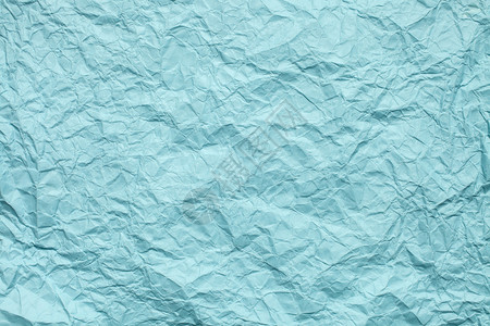 青色皱巴的纸背景背景图片