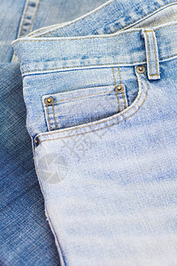 蓝色牛仔裤细节特写图片