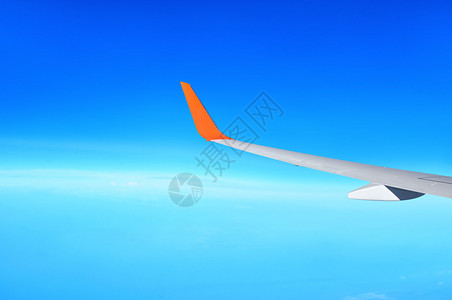 蓝天背景清晰的空中飞机翼旅图片