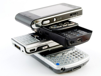 白色背景孤立的几种现代移动电话PDA手机提式单元图片
