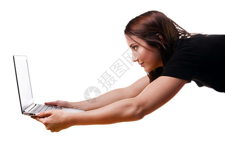 年轻的奇异商业女青年乘坐笔记本电脑在白图片