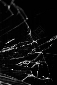 破碎玻璃黑色背景设计元素上的白色线条触摸断屏的图片